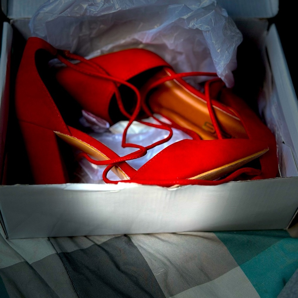 Red heels with tie up strings